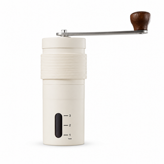 Alternate view of Yozcoffee white mini manual coffee grinder with wooden knob and visible grind level window